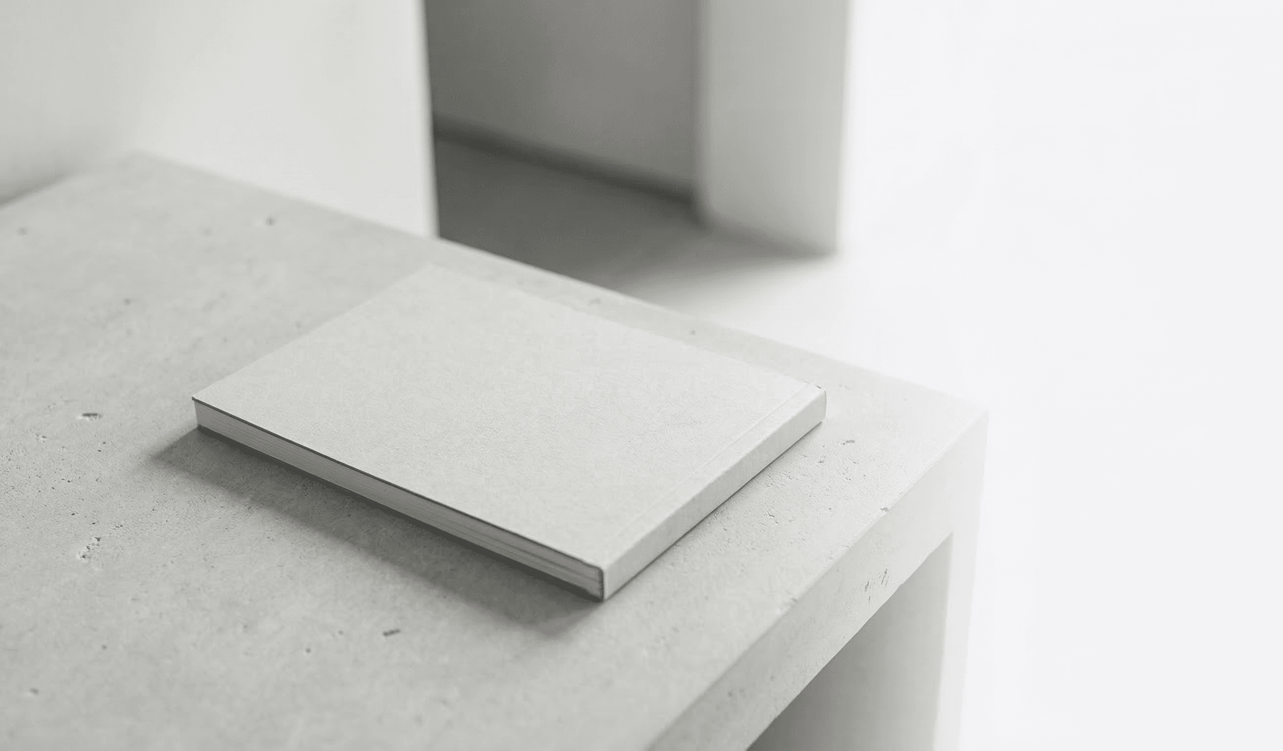 Series H - The Horizon lying flat on a minimalist console